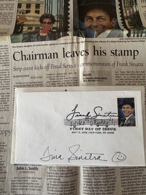 Frank Sinatra commemorative stamp autographed by Tina Sinatra with news article